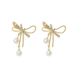 Load image into Gallery viewer, Elegant Pearl Bow Earrings
