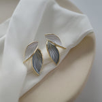 Load image into Gallery viewer, Grey Leaf Dangle Earrings
