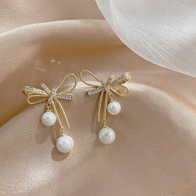 Elegant Pearl Bow Earrings